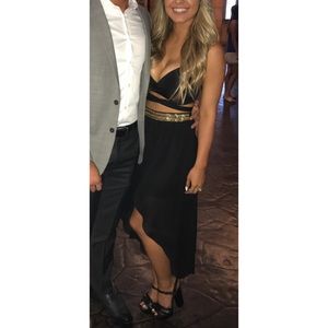 Black strappy dress with gold chains